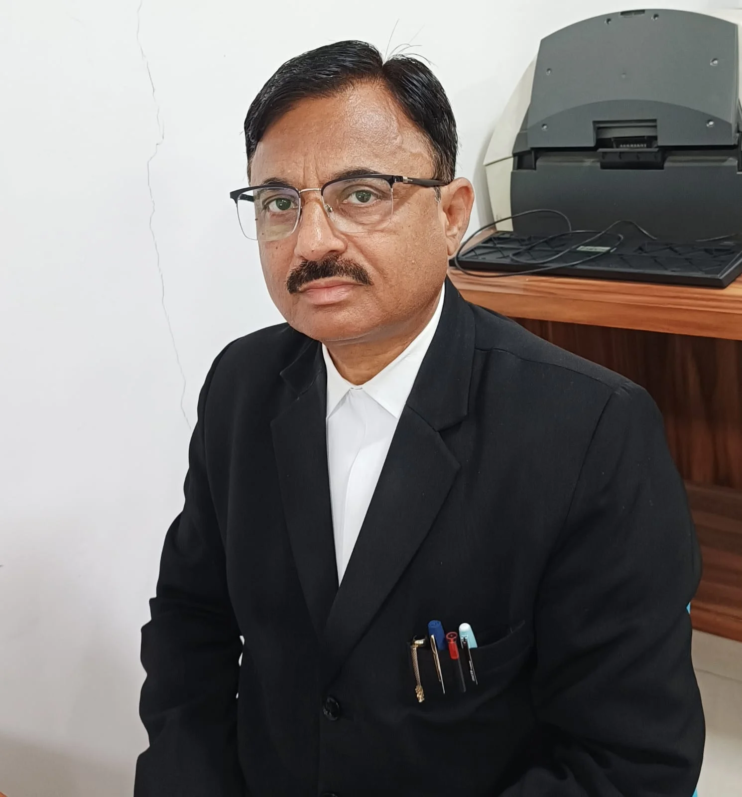 Adv. Ravindra Pande